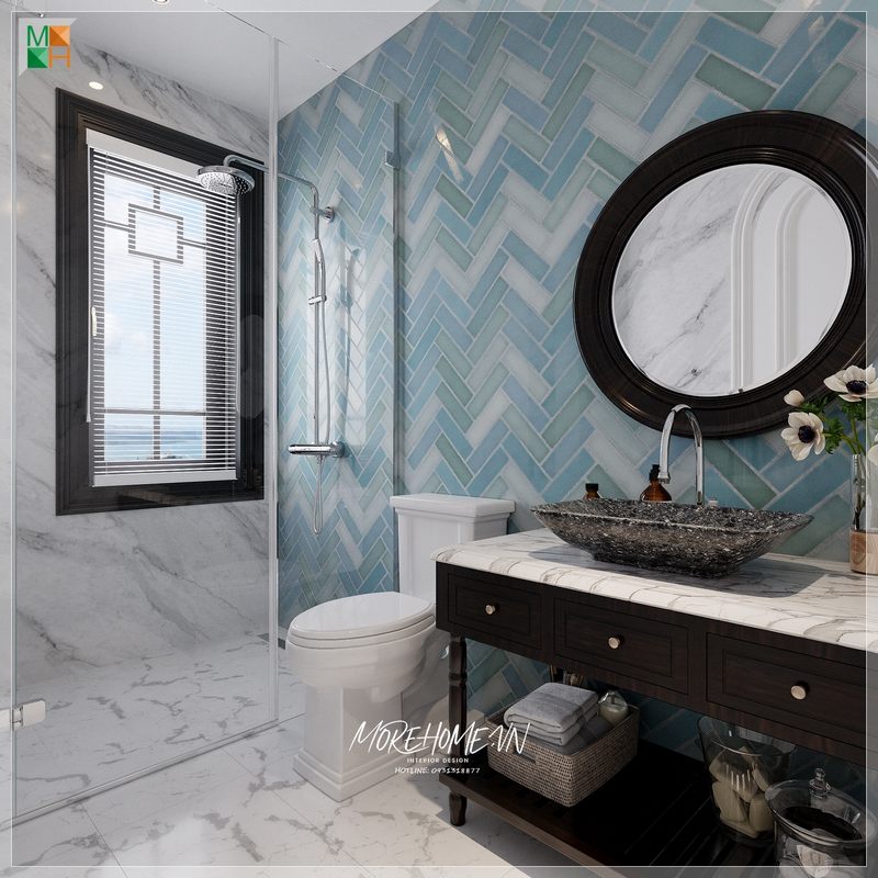 Mẫu tủ lavabo gỗ tự nhiên sơn đen, kết hợp với mặt đá nhân tạo màu trắng vân mây xám, góp phần nổi bật cho phong cảnh phòng tắm của các căn hộ, nhà phố, biệt thự phong cách Indochine.
